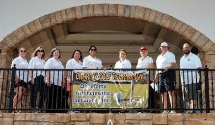 image of OIS board members and staff taken at the annual golf tournament